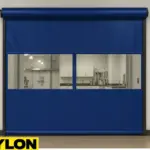 A Roll-Up Vinyl Door Manual installed in a university research lab, acting as a flexible divider between lab zones to maintain cleanliness and controlled access
