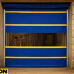 Creative use of roll up doors in livestock and agricultural barns, featuring a blue and yellow vinyl roll-up door partially open to reveal a green pasture outside a wooden barn interior