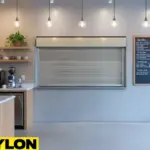 “Coffee shop service window with Roll Up Counter Door closed for security and organized workflow”