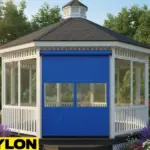 Gazebo with a blue roll up vinyl door used as the featured image for a blog about staying comfortable in any weather.