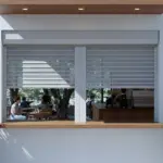 “Mall coffee kiosk secured with a Roll Up Counter Door for efficient service and equipment protection”