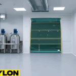 Mesh Roll Up Bug Door providing ventilation in a chemical mixing room with stainless equipment and clean floors.