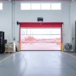 Roll Up Bug Door in a warehouse loading dock to block insects while providing clear visibility and airflow for forklift traffic.