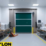 “Roll Up Bug Door installed in a packaging line area to support ventilation and reduce contamination risks during product handling.”