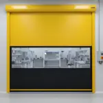 Yellow roll up door installed between laboratory clean room spaces
