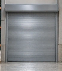 Standard steel roll-up door closed on a warehouse storage opening